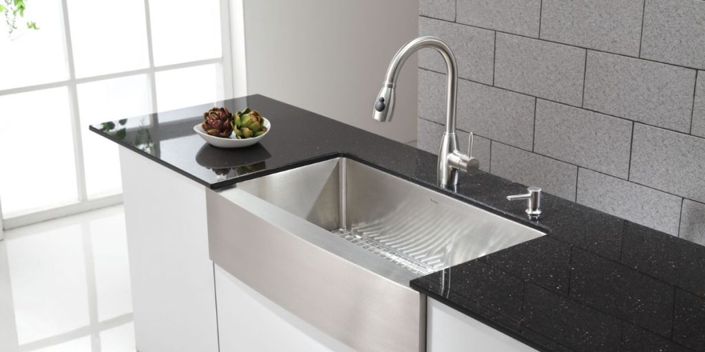 apron front sink with stainless steel faucet