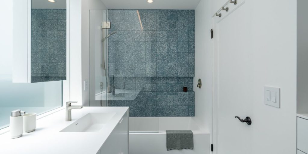 bathtub-shower-combo-in-a-white-coloured-bathroom