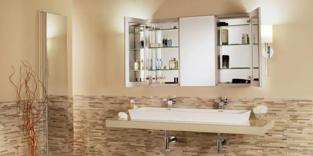 tri-view-mirror-cabinet-on-an-off-white-color-bathroom-wall