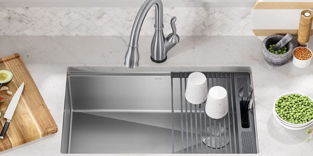 Undermount kitchen sink with drainboard by Delta